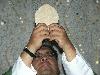 MR-135 Fr. Roberto and consecrated body of Jesus (22568 bytes)